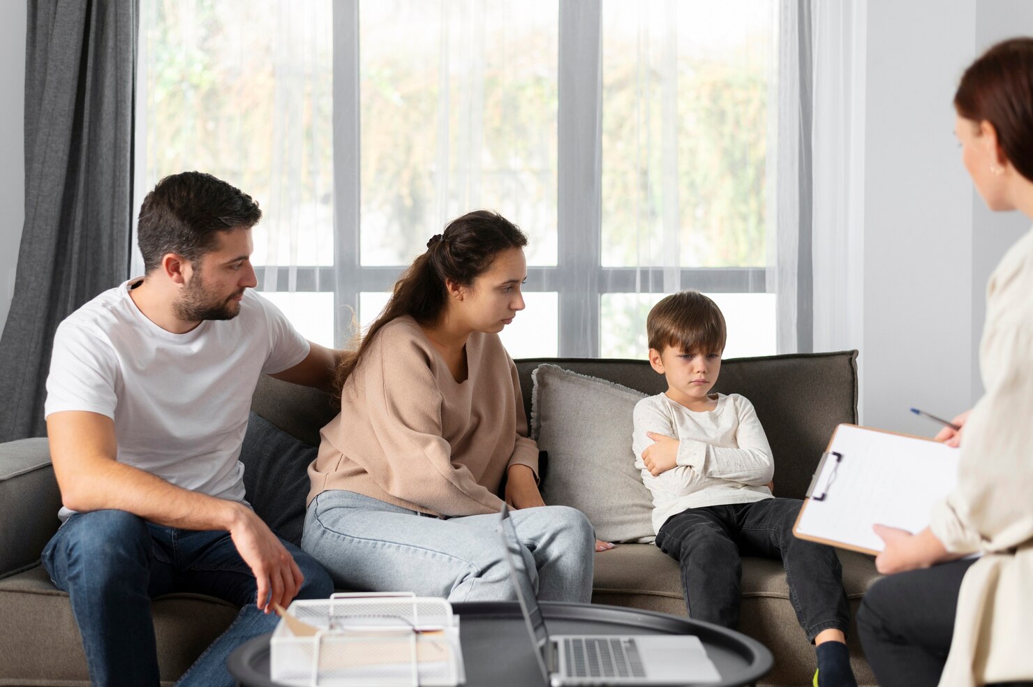 Close Up Family Discussing With Therapist 23 2149220323