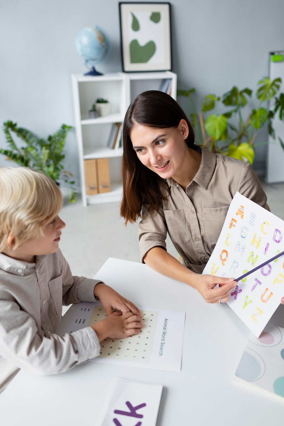 Woman Doing Speech Therapy With Little Blonde Boy 23 2149110231